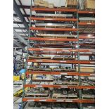 1 Pallet rack full- (19) spare dies, (3 pallets) water troughs and other misc. parts for extruders.