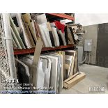 All items in the cage on the shelving consisting of wood, plexi glass, trim, cables, blue bins, wash