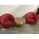Red sofa chairs, and round glass top table