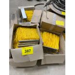 LOT OF YELLOW BRUSHES IN CASES