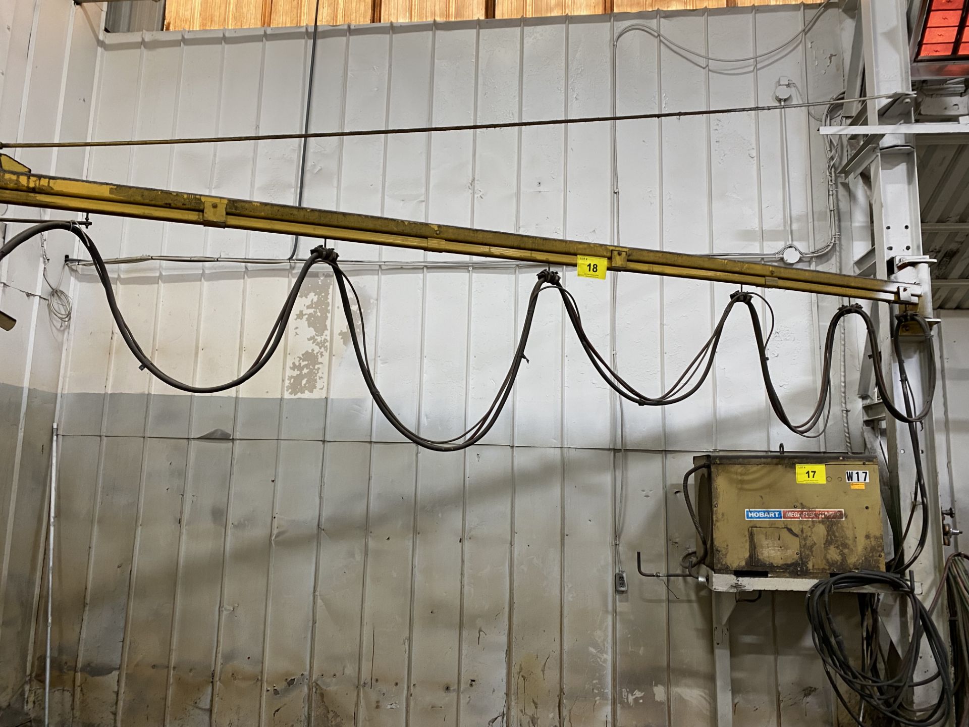 WALL MOUNTED WELDING JIB, APPROX. 16'L (BOLTED TO WALL) (RIGGING FEE $250)