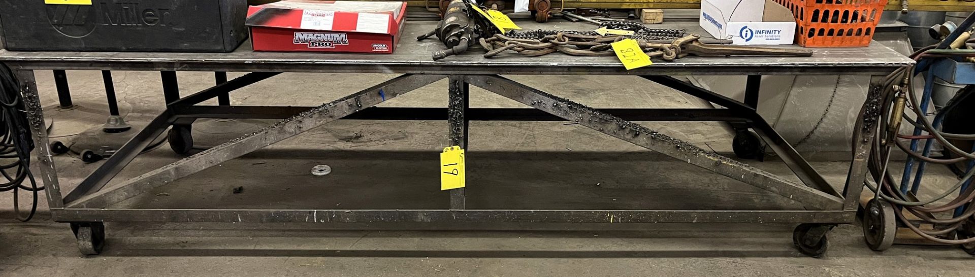 PORTABLE STEEL WELDING TABLE, APPROX. 10'L X 4'W X 1/2" PLATE TOP (NO CONTENTS)