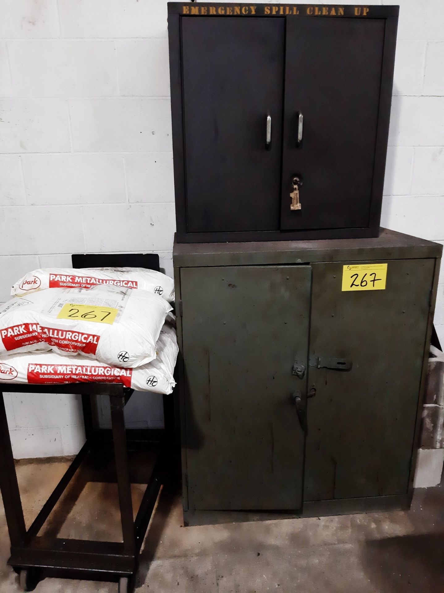 LOT OF (2) 2-DOOR METAL CABINETS AND (4) BAGS OF PARK METALLURGICAL THERMO-QUENCH WHITE