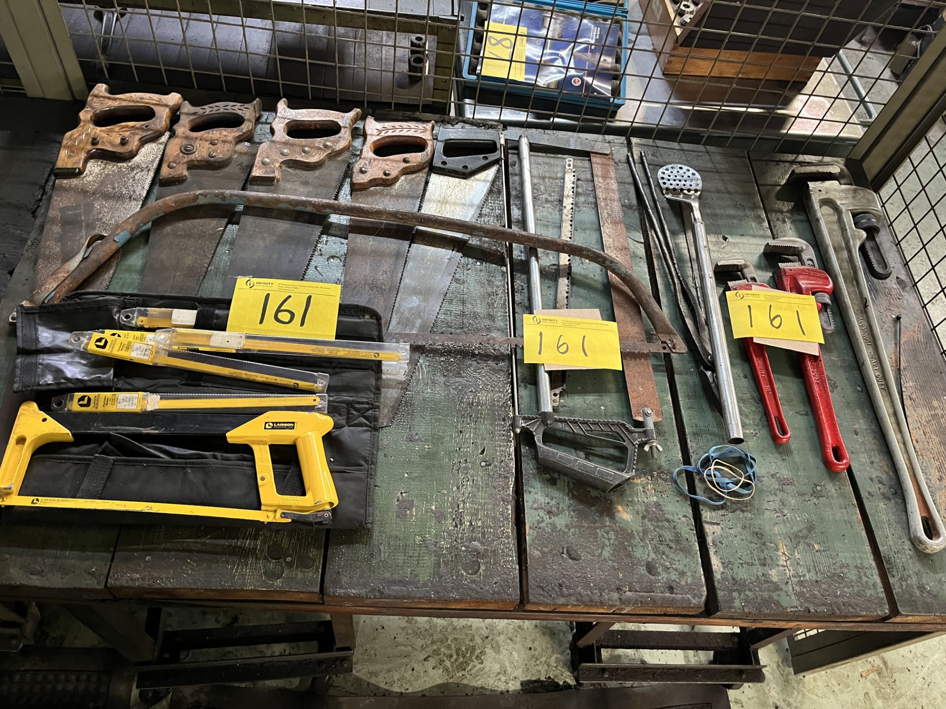 LOT OF SAWS AND PIPE WRENCHES