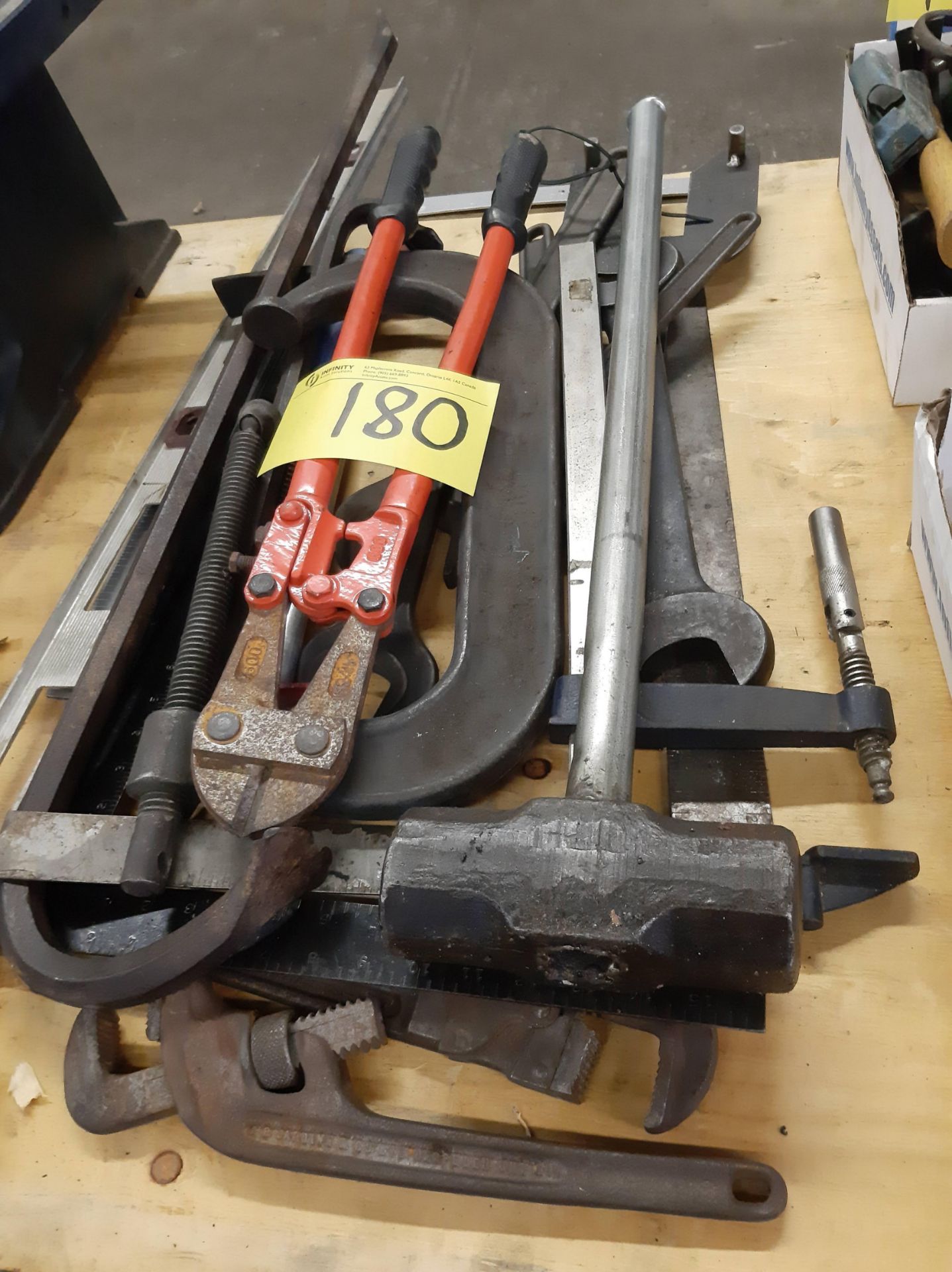LOT OF LARGE HAND TOOLS, SLEDGE HAMMER, BOLT CUTTER, LEVEL, PRY BAR ...