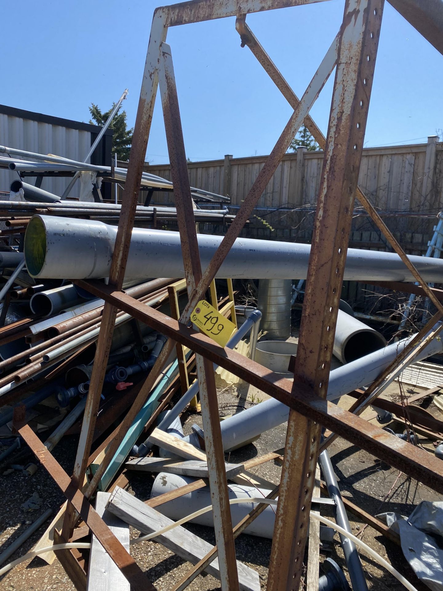 LOT OF (4) METAL STORAGE RACKS W/ PIPE AND CONTENTS (METAL AND PLASTIC), BATTERY ROLLER TRAY, ETC. - Image 4 of 7