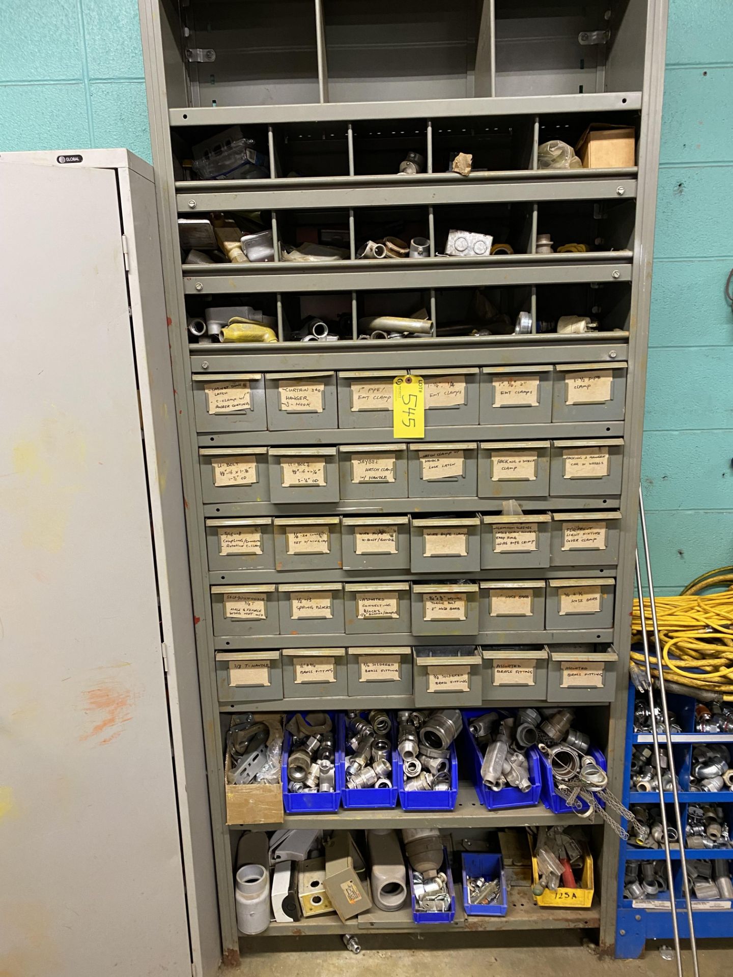 SHELVING UNIT W/ 11-LEVELS AND PARTS BINS W/ ELECTRICAL CONNECTORS, SPRING BLOCKS, CLAMPS, HARDWARE,