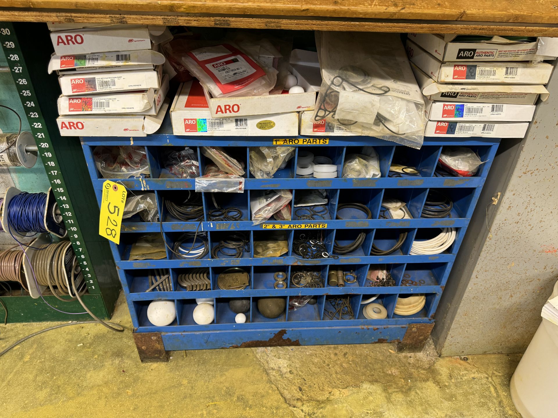 WIRE SPOOL RACK, PIGEON HOLE CABINET W/ ARO KITS, GASKETS, SHELVING UNITS W/ SANDING BELTS, SAFETY