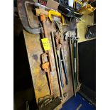 LOT OF CONDUIT BENDERS, BOLT CUTTERS, SLEDGE HAMMER, PIPE WRENCHES, CHANNEL LOCK, C-CLAMPS ON TABLE