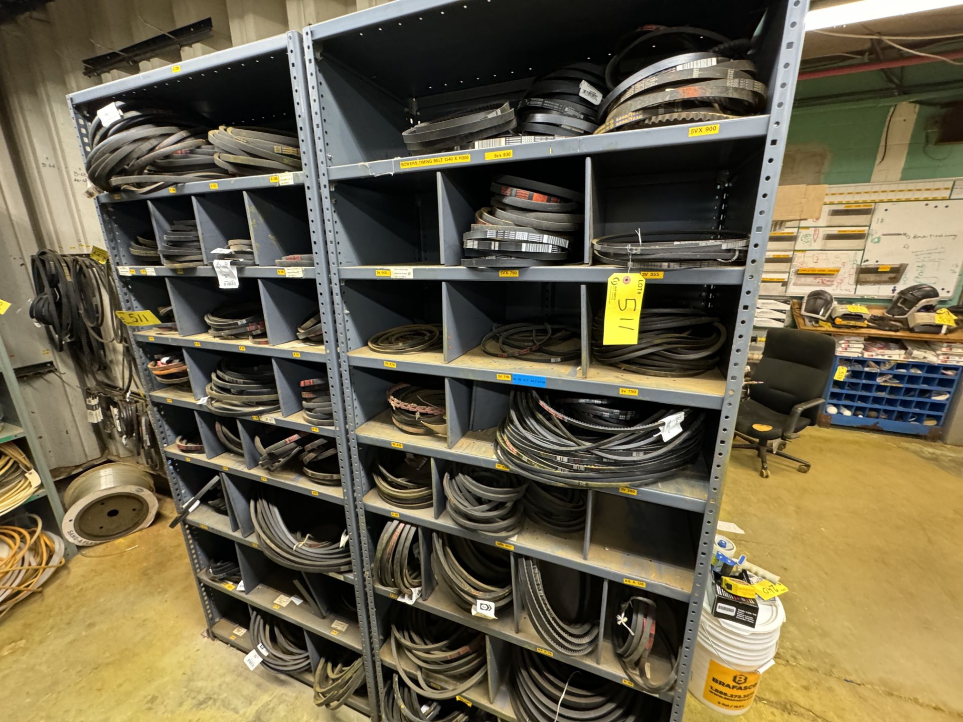 LOT OF BELTS W/ (2) CABINETS AND HANGING RACKS