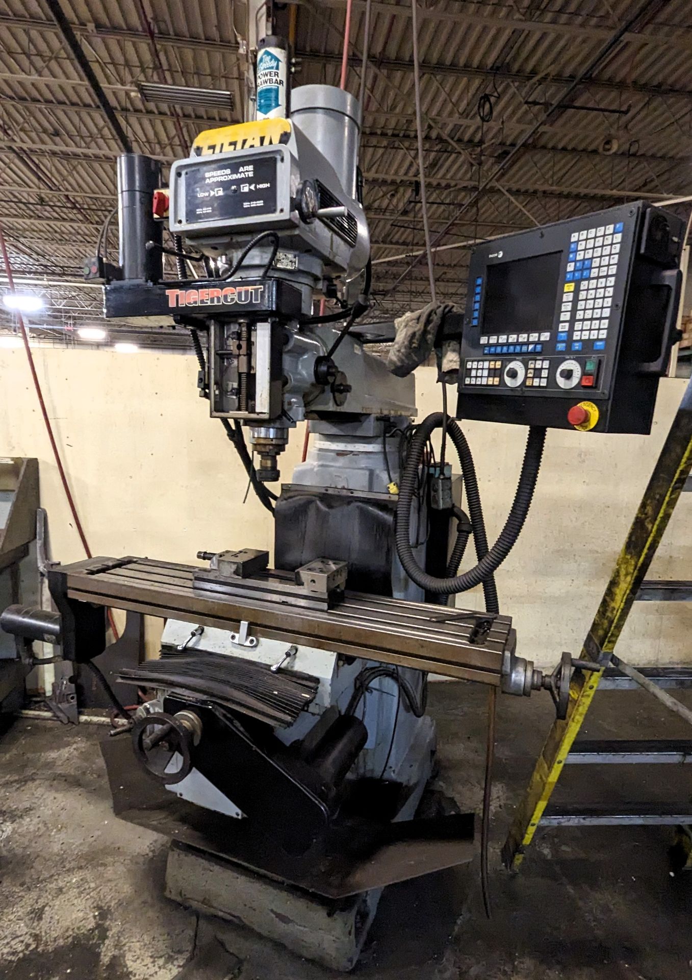 PARTIAL VIEW OF MILLING MACHINES AND LATHES