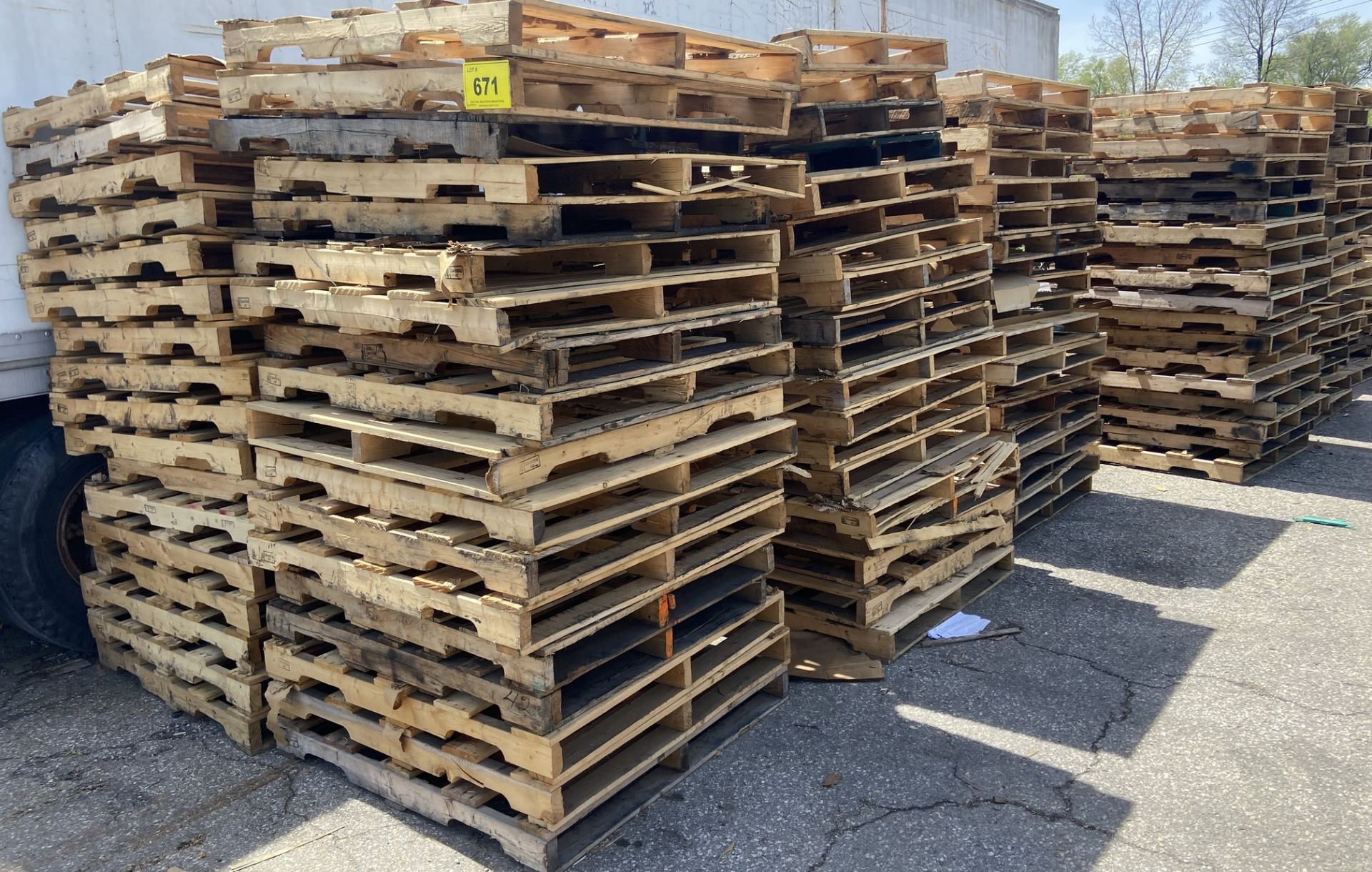 APPROX (125) WOODEN PALLETS