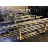 LOT OF (4) STEEL HOLDING RACKS C/W ASSORTED SIZES OF 409 STAINLESS STEEL TUBS
