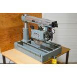 DELTA 10 10” RADIAL ARM SAW, BLADE SIZE 20” X 30” X 4.75”H, RIP CAP. 0-14” IN / 12” – 24” OUT, BLADE