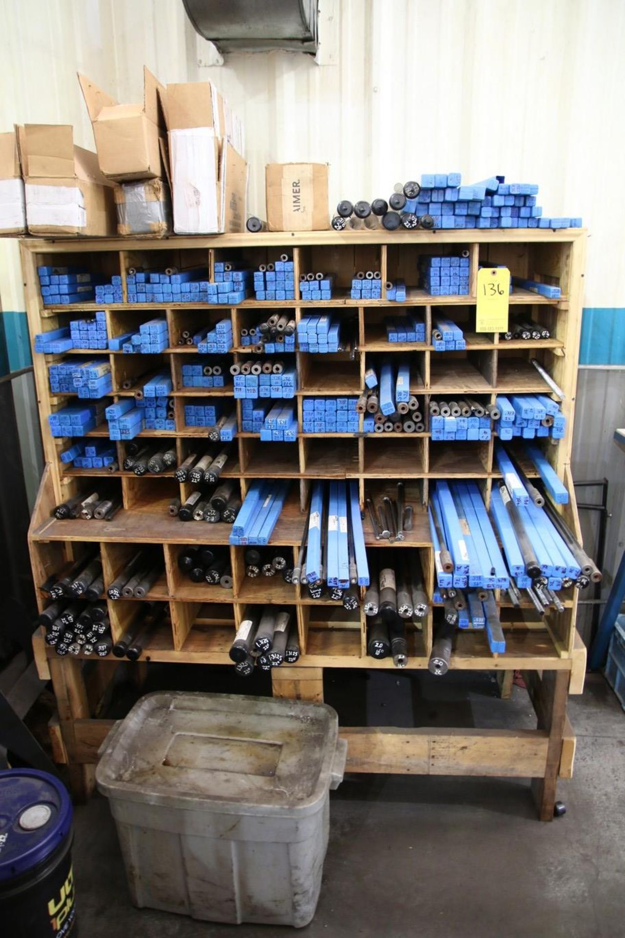 Wooden Shelving with Various Gun Drills and Pins