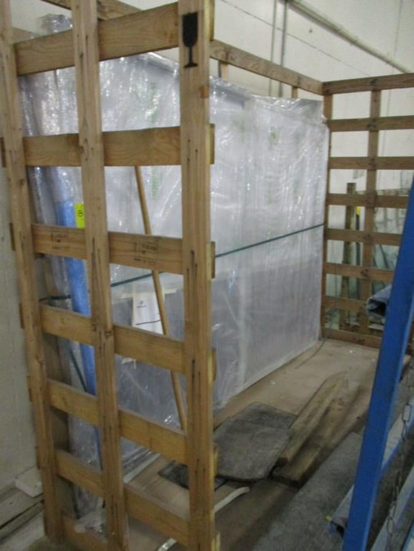 SINGLE SIDED METAL FRAME GLASS RACK, APPROX 5' X 7' X 5' W/ (12) VARIOUS SIZE GLASS, WOODEN CRATE 3'