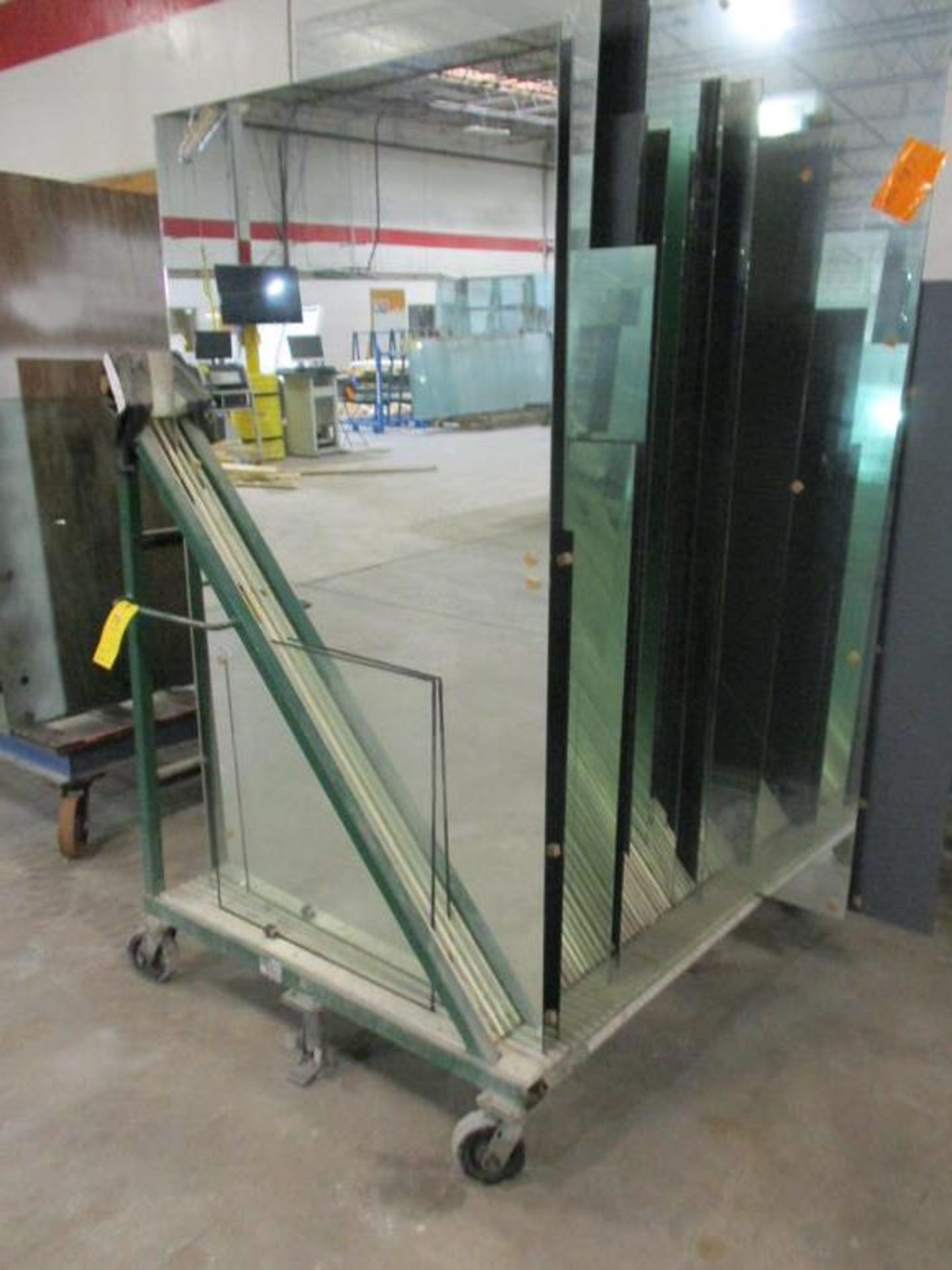 PORTABLE ON SIDED METAL GLASS RACK, APPROX 5' X 6' X 5' W/ (18) VAR SIZE GLASS