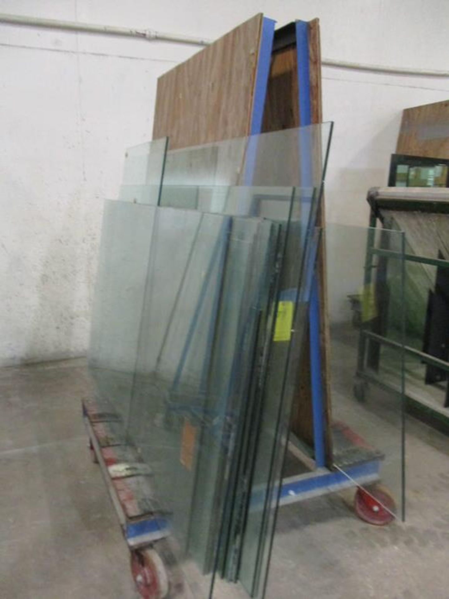 PORTABLE DOUBLE SIDED METAL GLASS RACK, APPROX 5' X 5' X 7' W/ (16) VAR SIZE GLASS