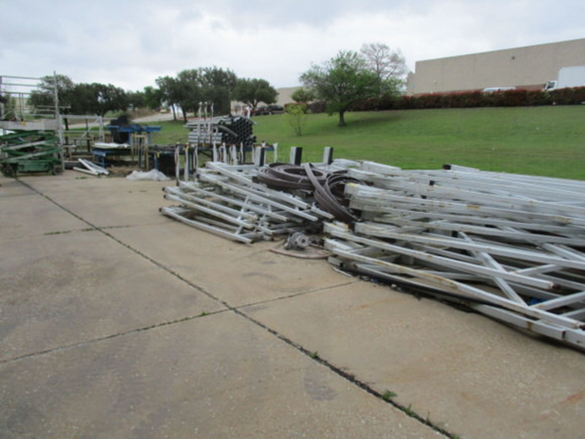 ASSORT RACKS, TABLES, CONDUIT, SCISSOR LIFT, SOLD AS SCRAP