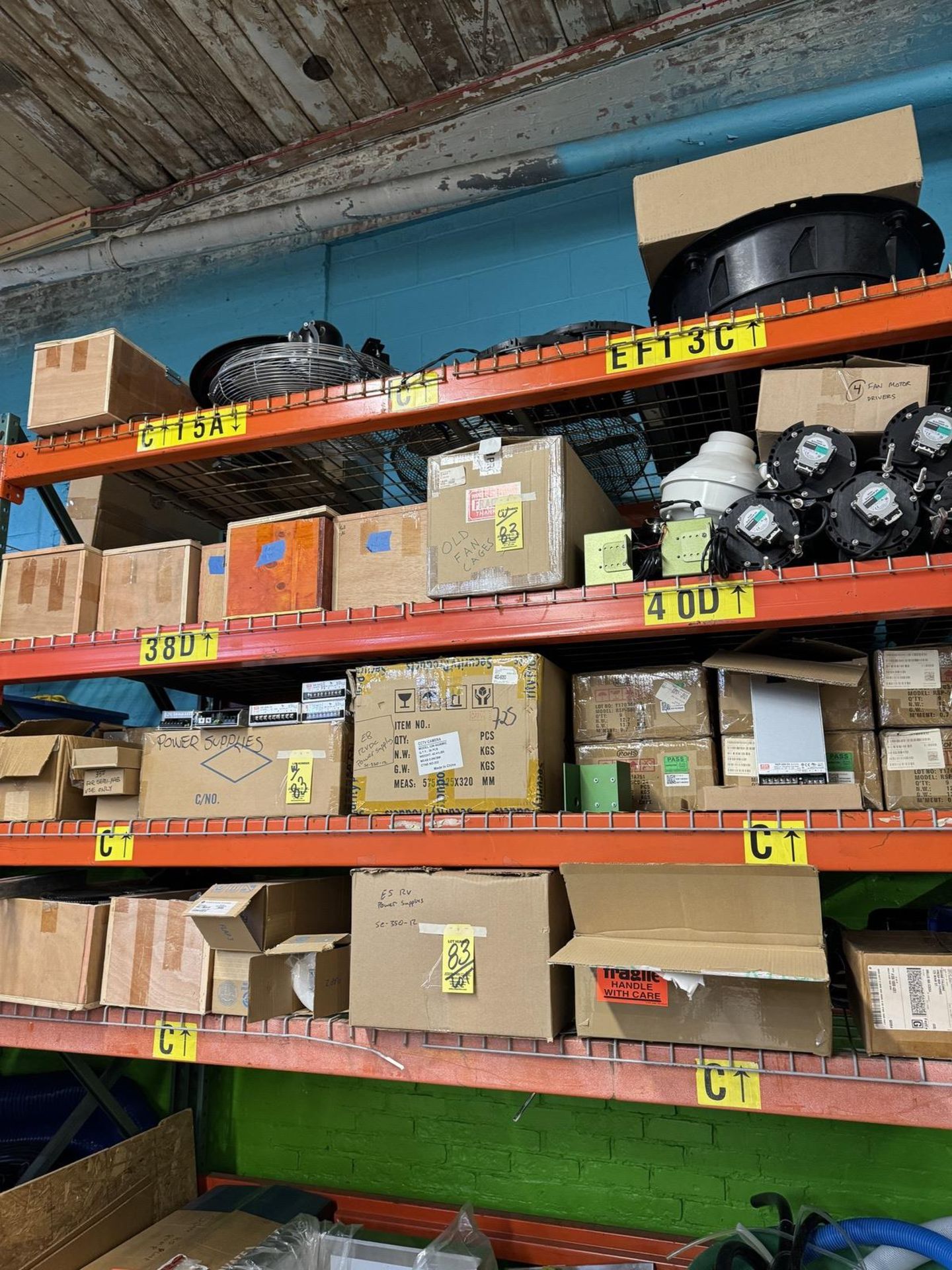 Contants of Shelves Including Power Supplies, Filters, Fan Cages, Fans, hoses, Alum. Rail, Plastic