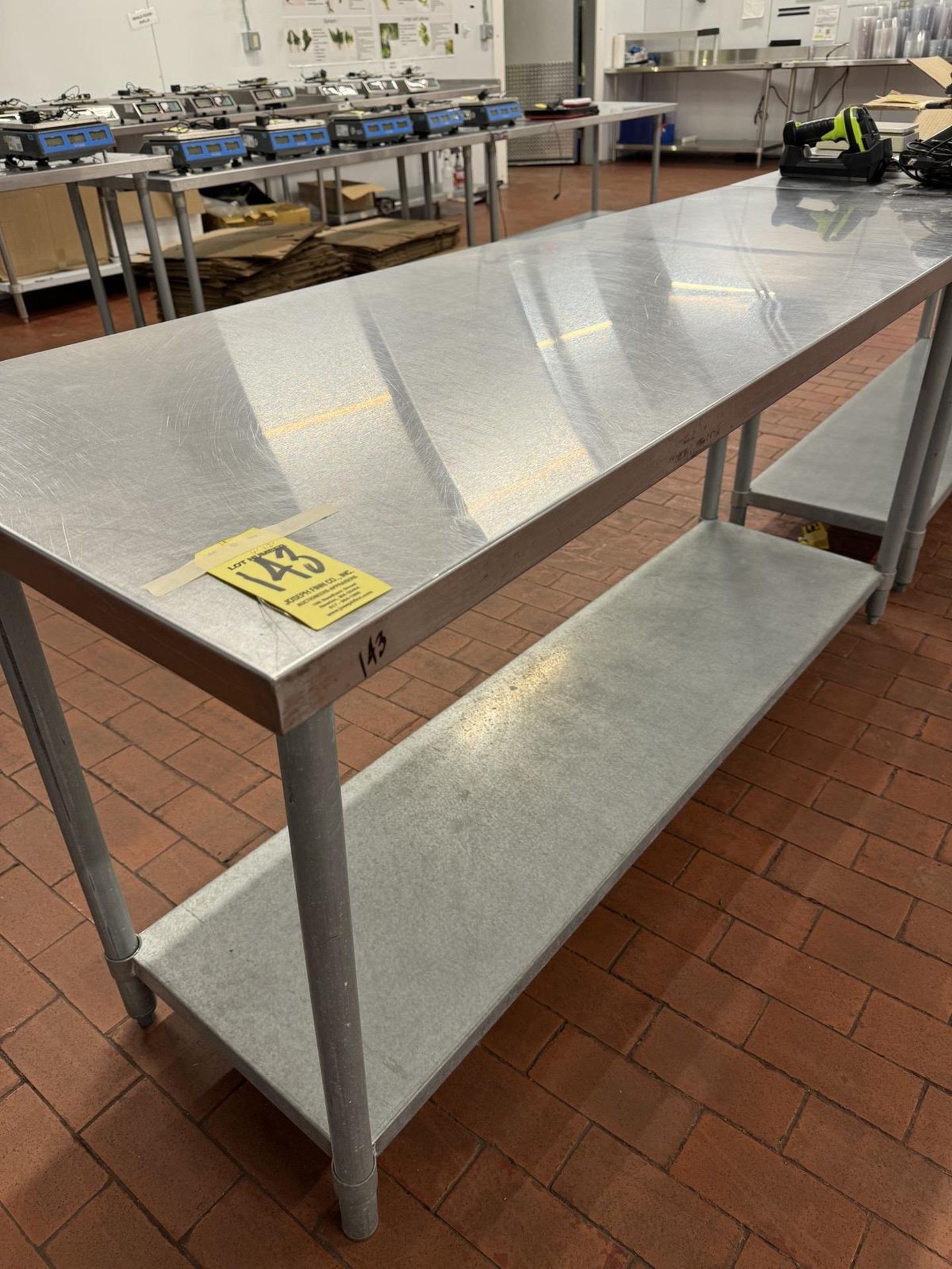 (1) 2 Tier Stainlesss Steel Top Table, 6' x 2'