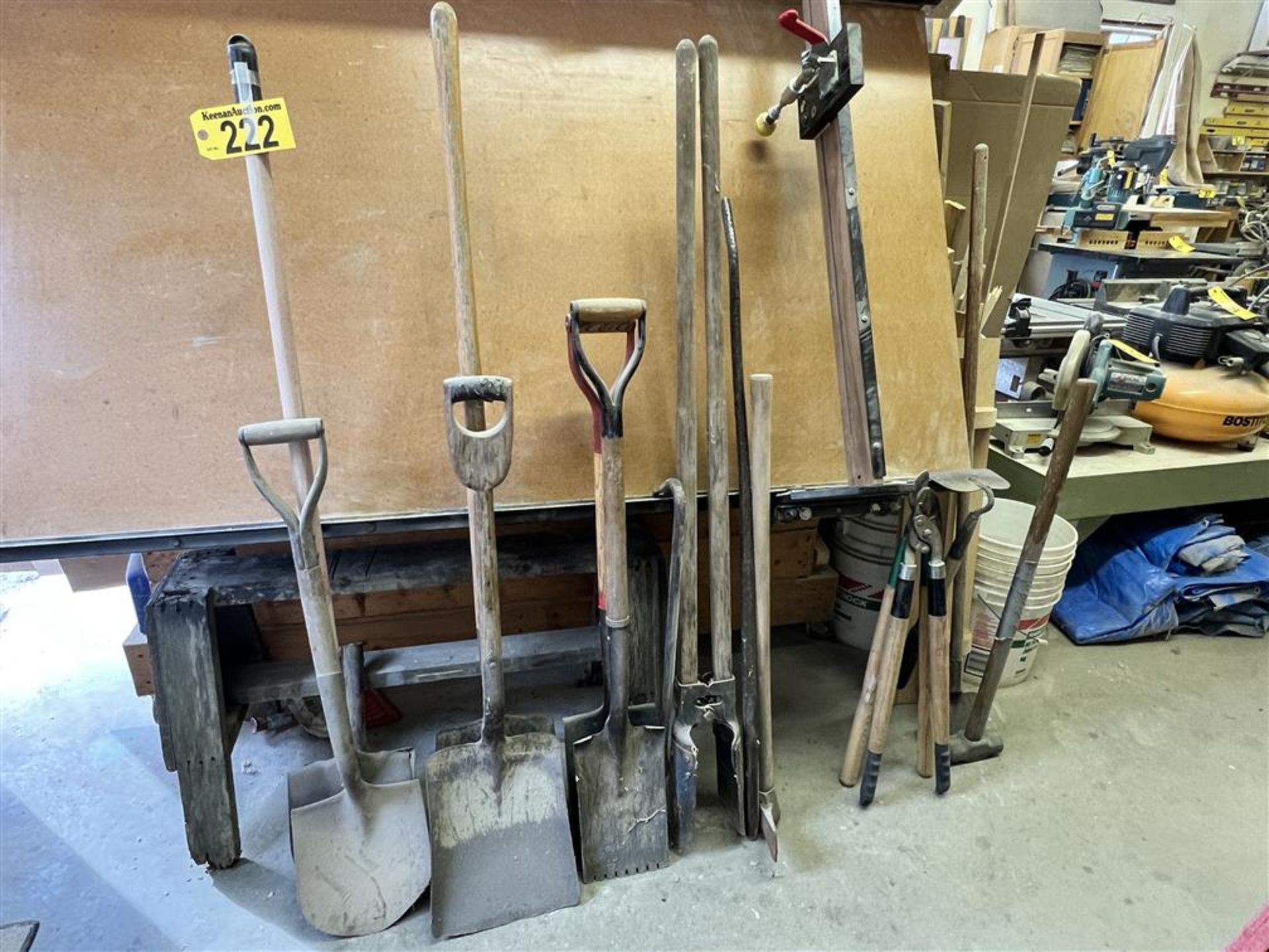 LONG HANDLED TOOL LOT: SPADES, SQUARE TIP SHOVELS, POST HOLE DIGGER, CROW BAR, SLEDGE, HOE