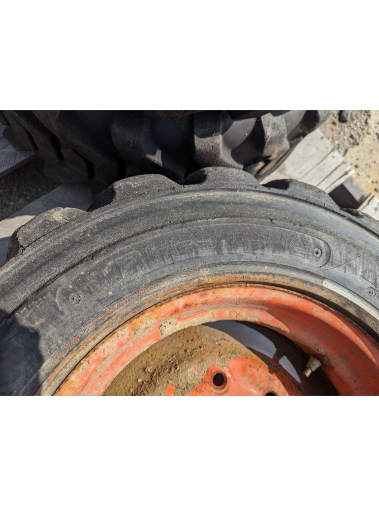 4 10-16.5 Skid Steer Tires & Rims - Image 6 of 7