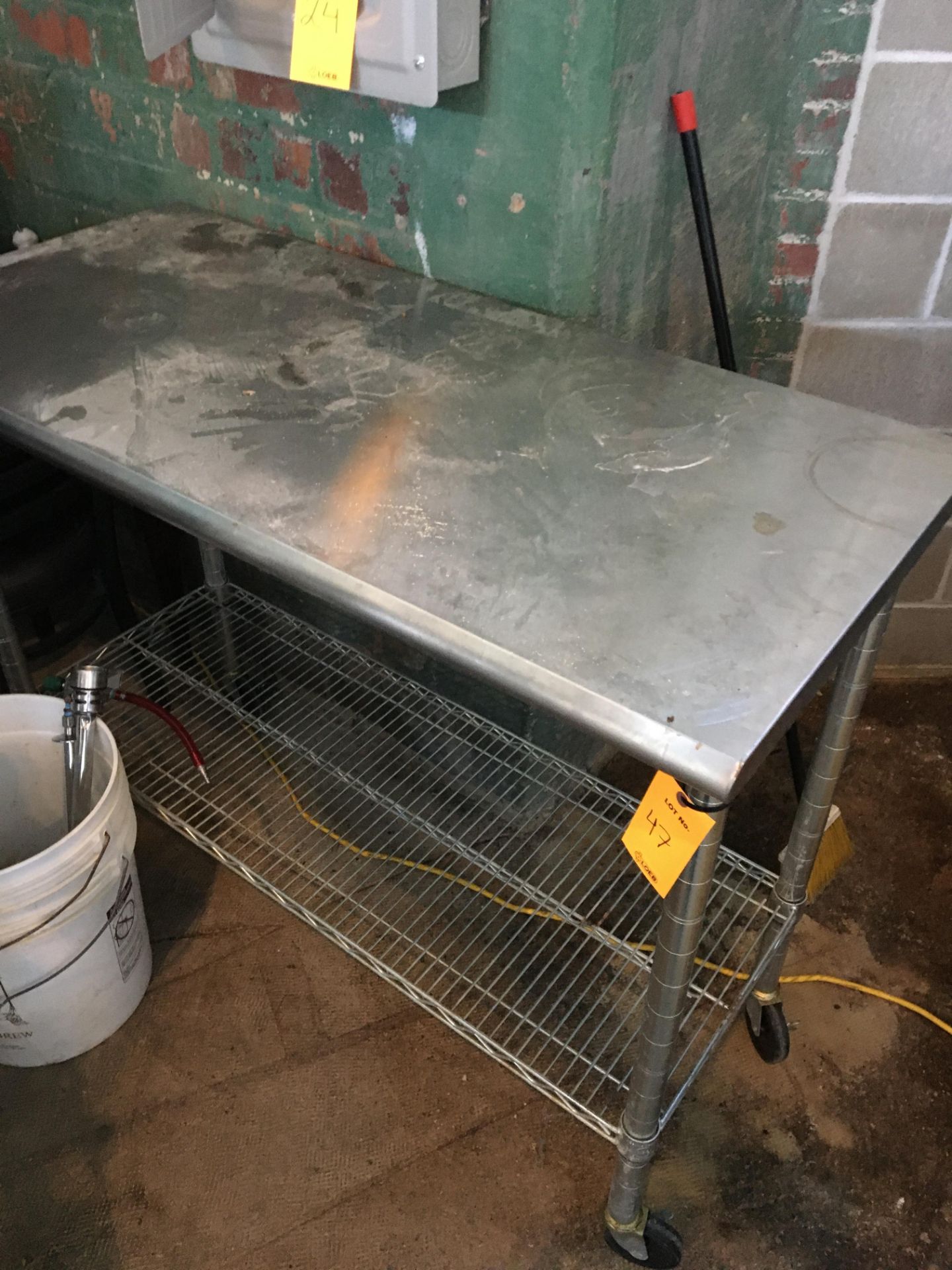 Unknown Table With Wheels, Stainless Steel; table on wheels with a rack on the bottom for storage