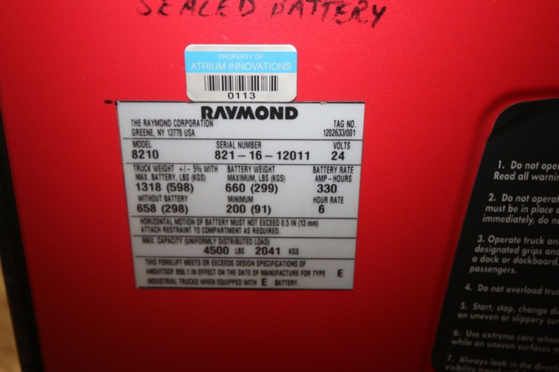 Raymond 4,500 lb Capacity 24V Electric Pallet Jack Model 8210, SN 821-16-12011, with 110V Self - Image 5 of 5