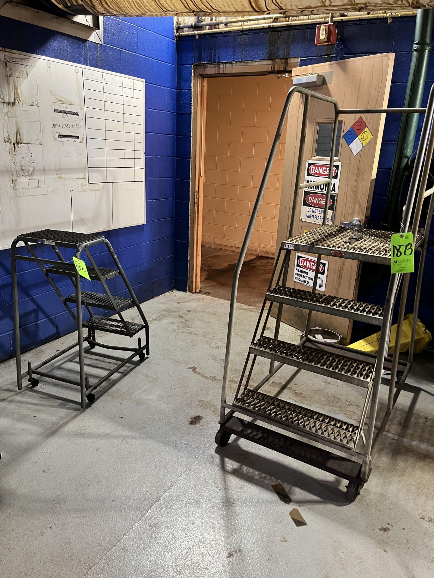 TWO SMALL PUSH LADDERS ON WHEELS (Simple Loading Fee $137.50)