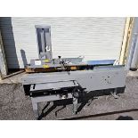 CHICAGO TAPERS Semi-automatic case erector with integrated top and bottom case sealer; Model CT-33PS