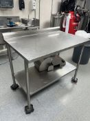 STAINLESS STEEL WORK TABLE DIMS APPROX 48" L 29" W 40" H (Located Cleveland, OH)