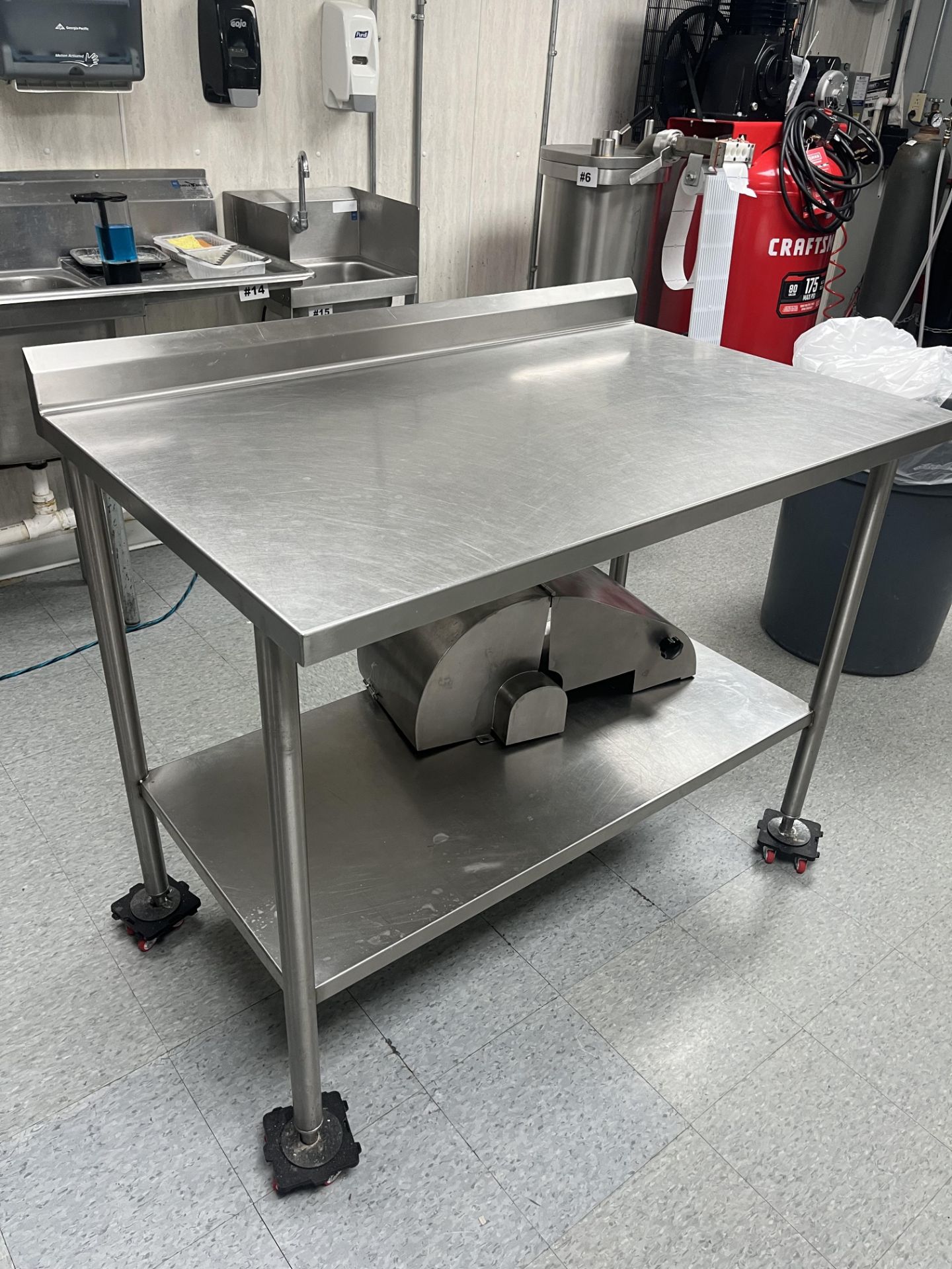 STAINLESS STEEL TABLE (DIMS 48"L 27"W) (Located Cleveland, OH)