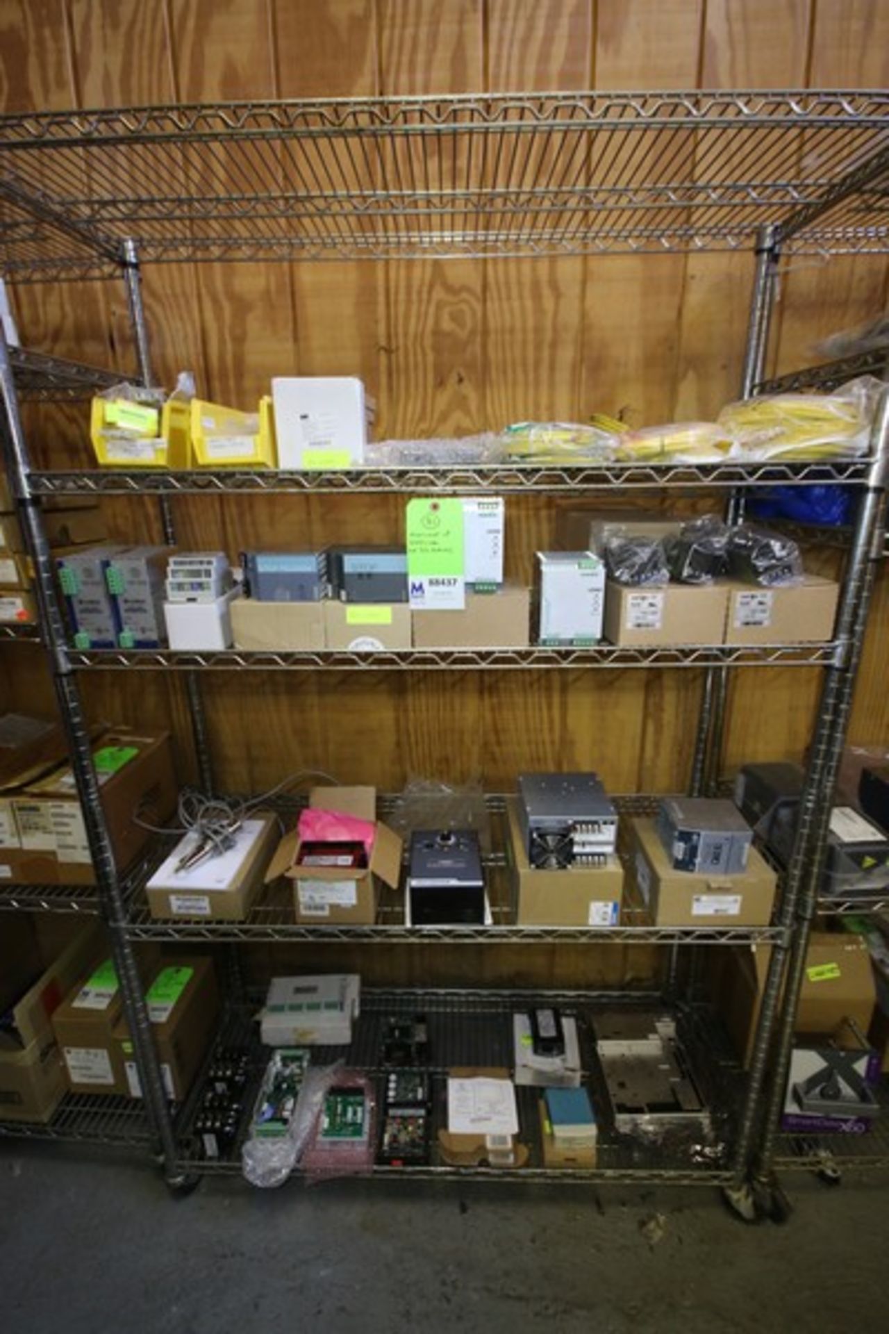 Assortment of Electrical Items on (4) Shelves Including Assortment of Power Supplies Including (2)