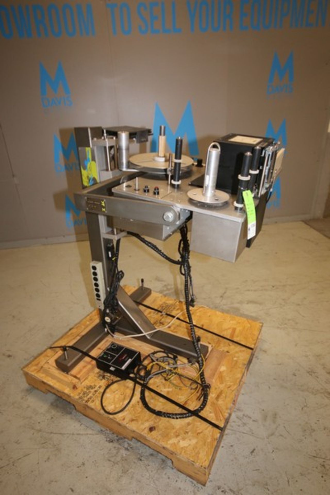 XPak Roll Fed Labeler, Model XP-A8200, SN SX052010, 115V, Mounted on Stand with Top Mounted Sato M-