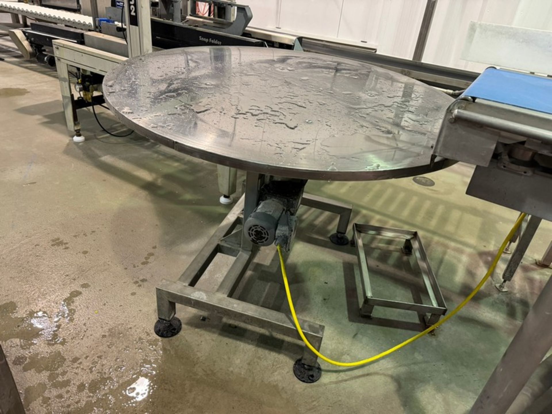 S/S Accumulation Table, Aprox. 48” Dia., with Motor, Mounted on S/S Frame (LOT SUBJECT TO BULK BID