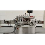 NJM CLI Labeler. Model: UNI510E-S009, Serial: 63099EA.1, 120 Volts, 60 Hz, Single Phase, 90 PSI.