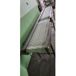 Conveyor S/S 11feet long x 18inch large x 32inch heught, all in stainless steel, on legs. Powered by