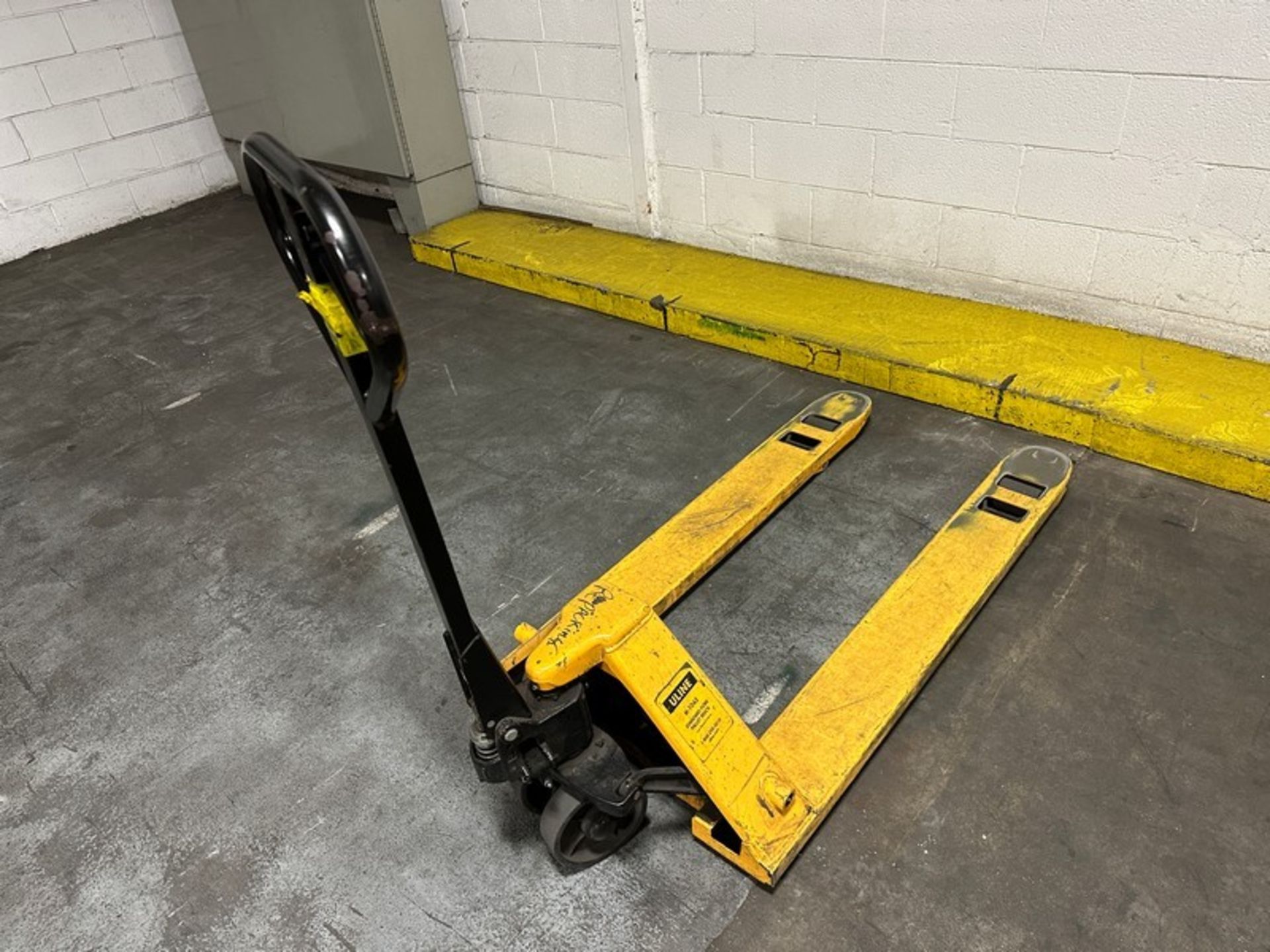 Pallet Jack: Uline 5,500lbs 48 x 27", Yellow (Located East Rutherford, NJ) (NOTE: REMOVAL 2-DAYS - Image 2 of 4