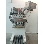 Kaps-All capper Model E. With feeder system Model FSRF-24 in good working condition 120 volts 1