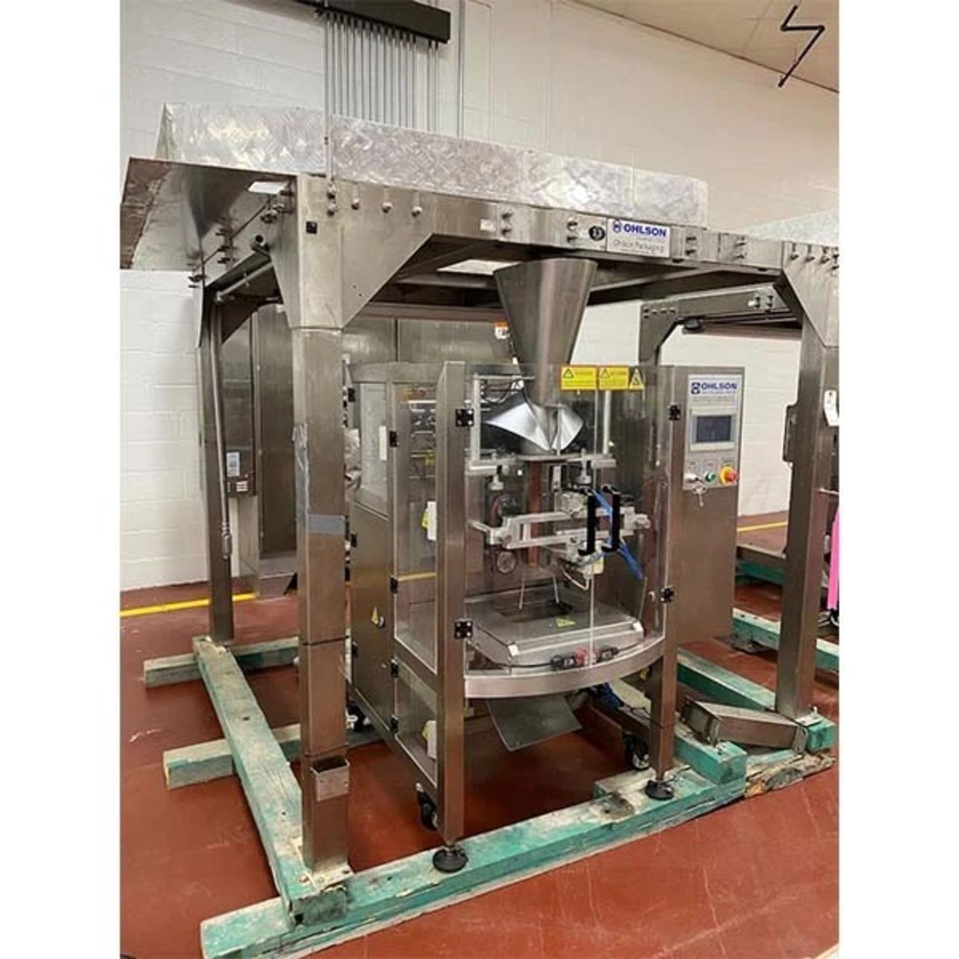 2018/2019 Ohlson Continuous Weighing and Vertical Form, Fill and Seal System includes