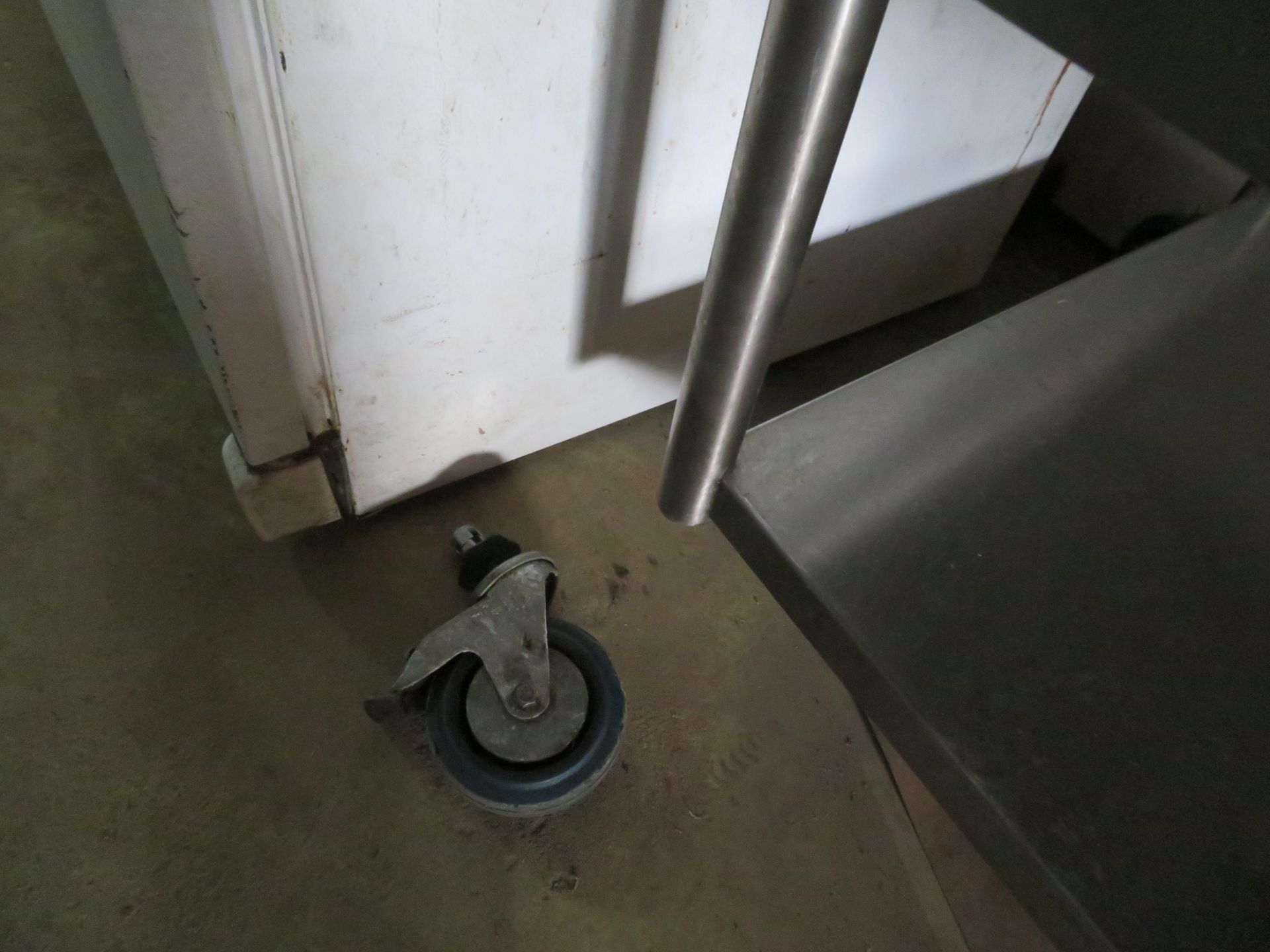 Stainless steel table with can opener approx. 60"w x 30"d x 34"h (AS IS) - Image 2 of 3