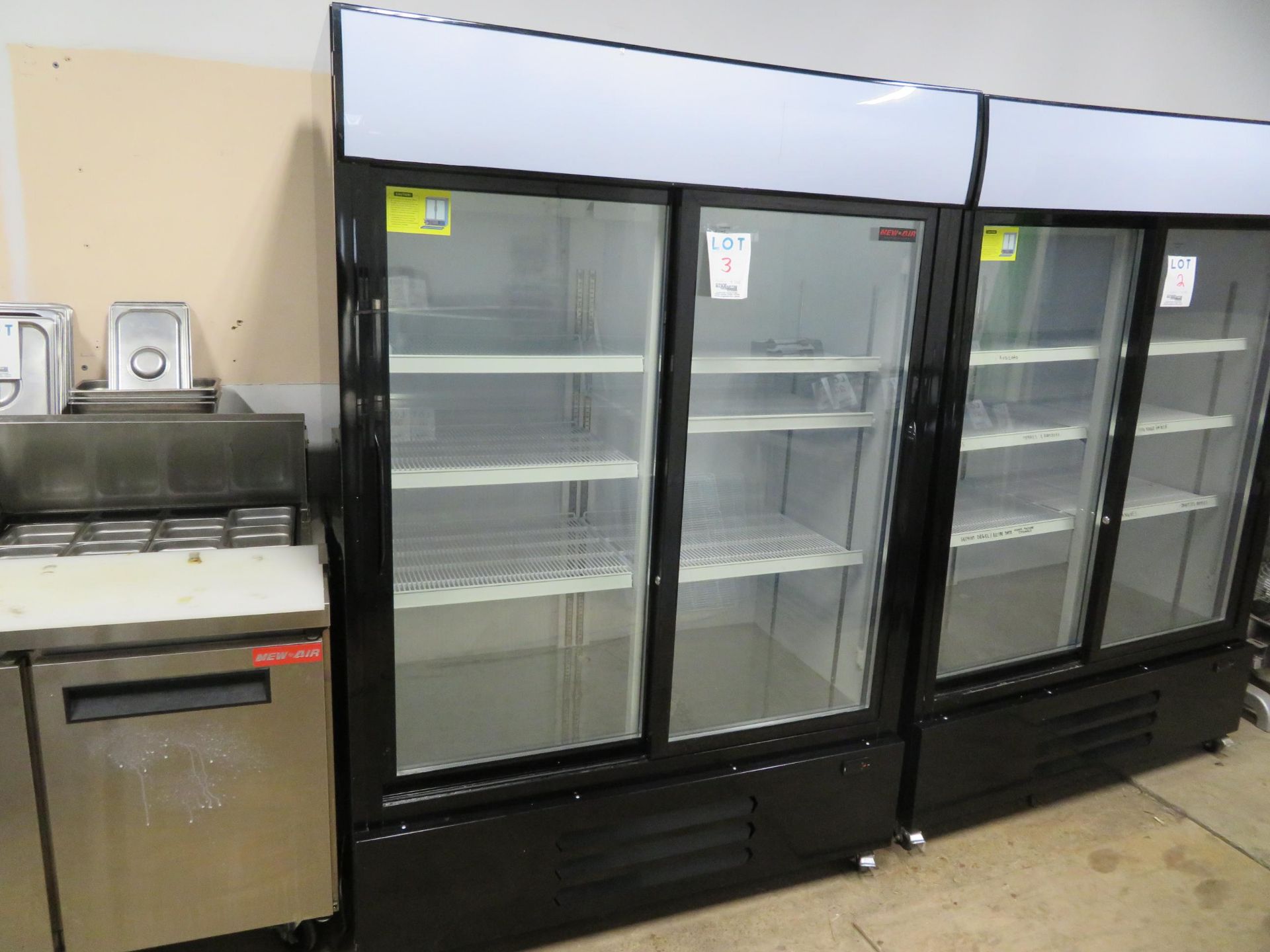 NEW AIR 2 door glass upright refrigerator on wheels, Mod # NGR-115S, approx. 54"w x 29"d x 78"h - Image 2 of 4