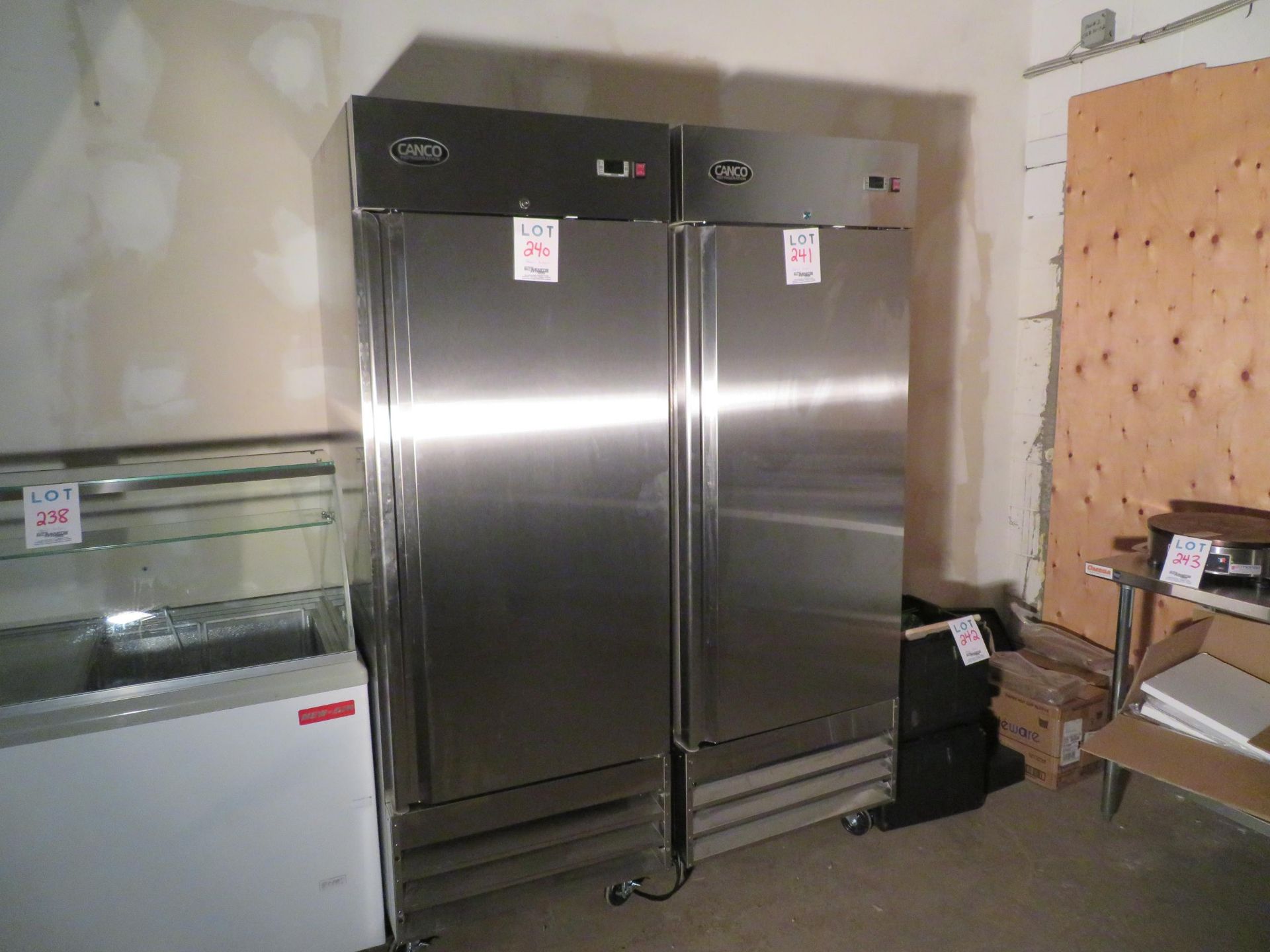 CANCO 1 door stainless steel upright freezer on wheels, Mod # SSF-650, approx. 28"w x 32"d x 77"h