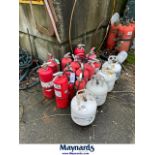 lot of fire extinguishers and propane tanks