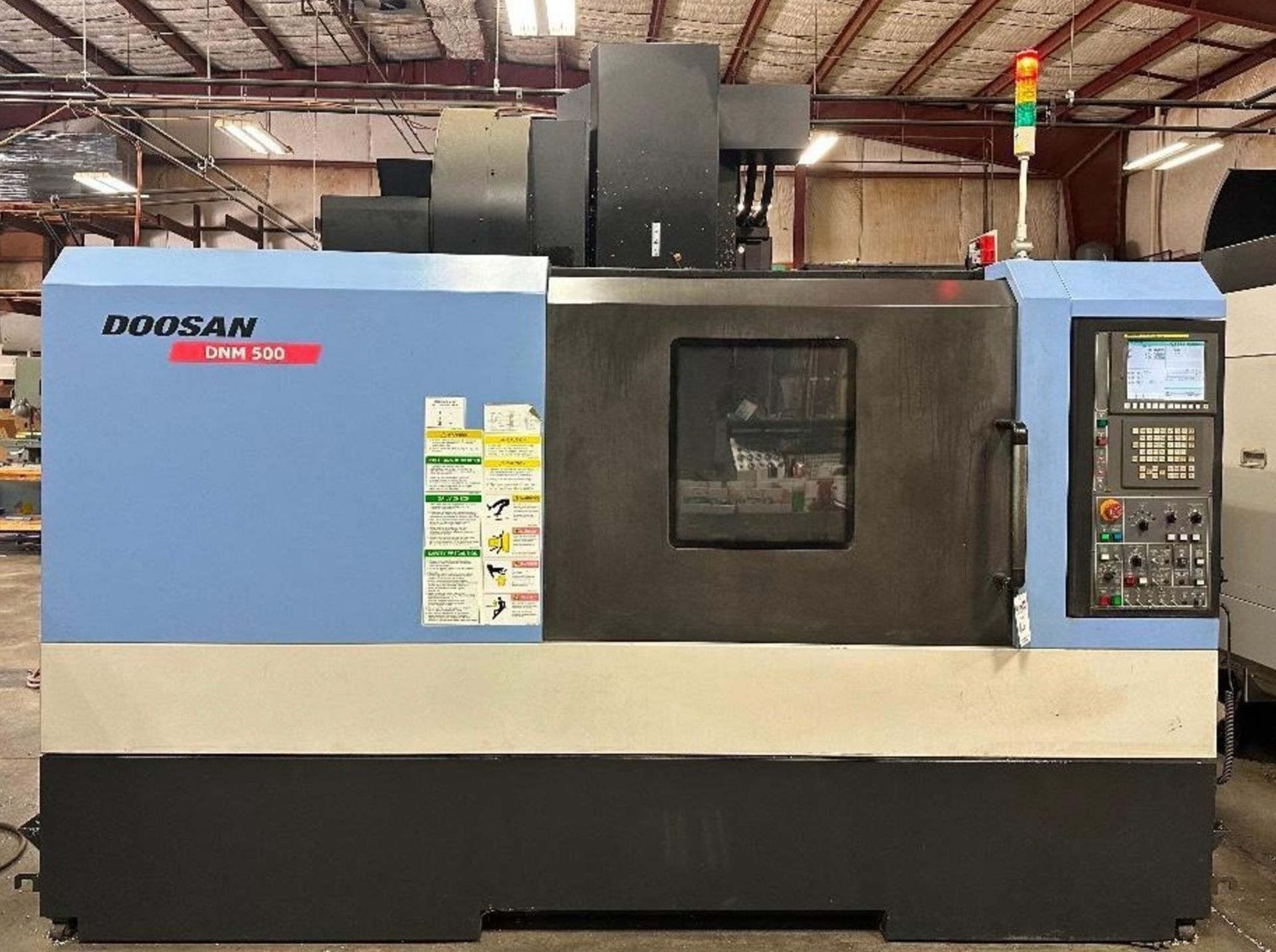 Doosan DNM 500 Vertical Machining Center, Fanuc i Series Control, New 2011 *Off-Site Machine*