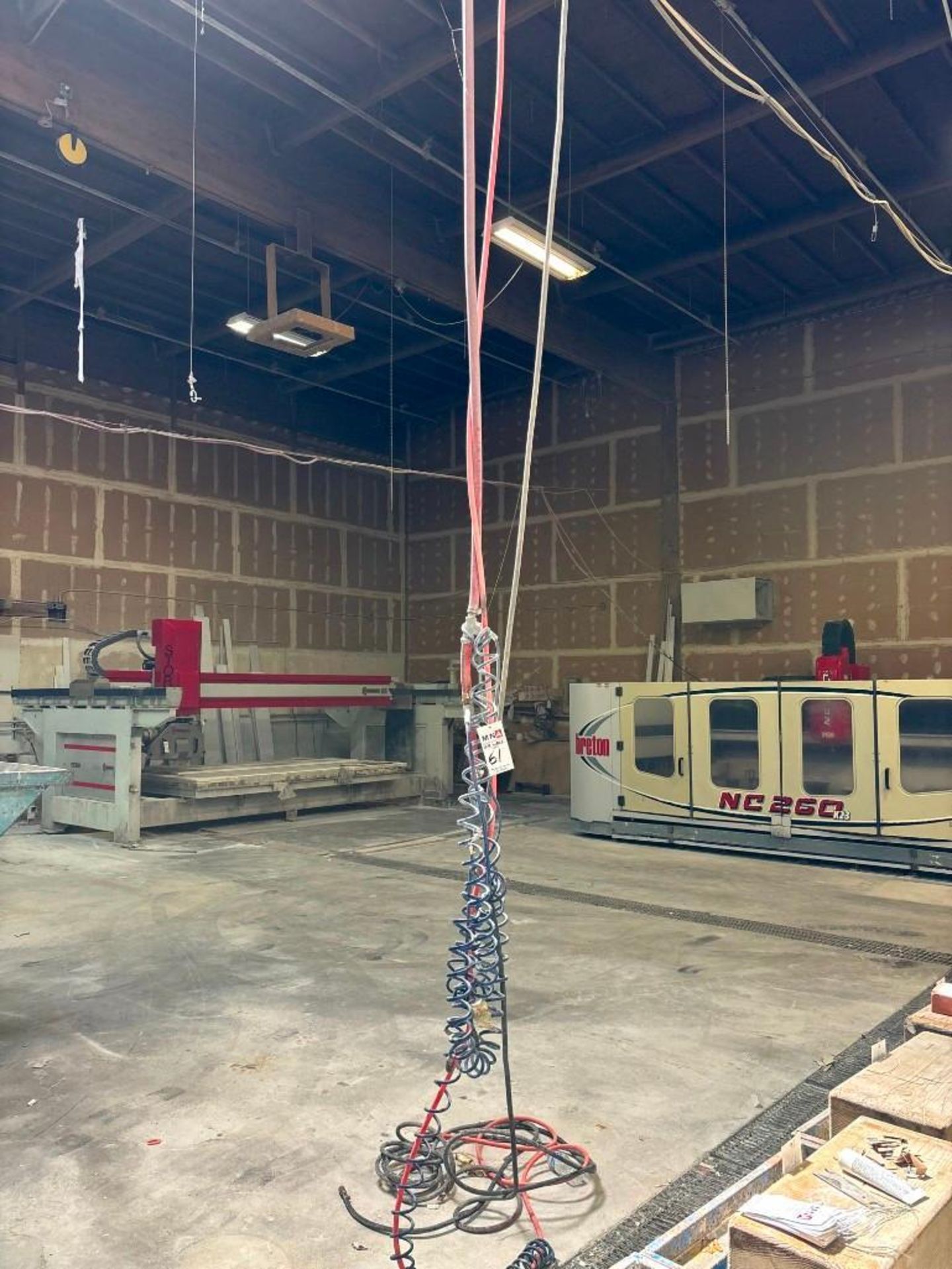 Air Lines and Water Hoses Throughout Facility