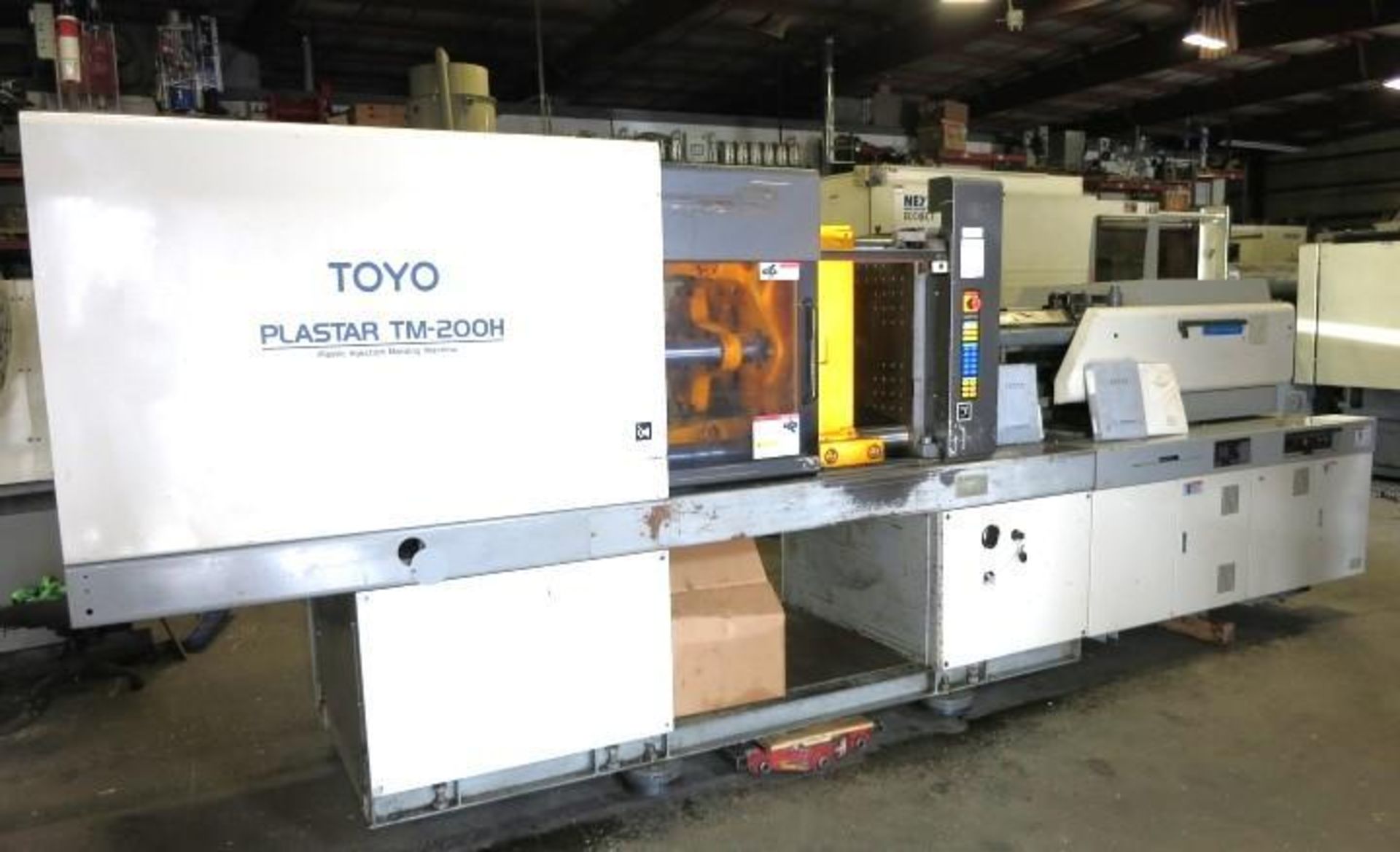 200 Ton Toyo TM-200H Injection Molding Machine, 6.7oz Shot Size, 2000