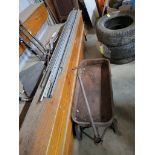 Radio Flyer Wagon And A Large Group Of Shelving Tracks