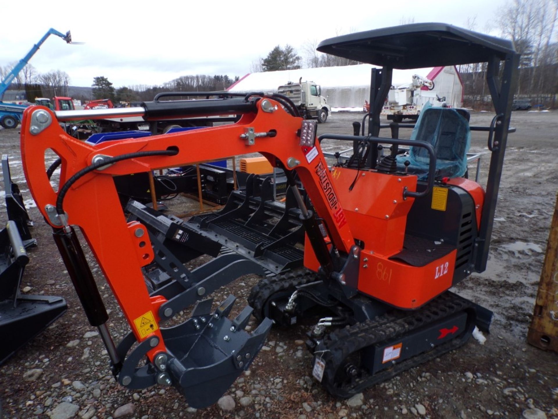 New Orange AGT Industrial L12 Mini Excavator with Gas Engine, Grader Blade, Stationary Thumb, Has